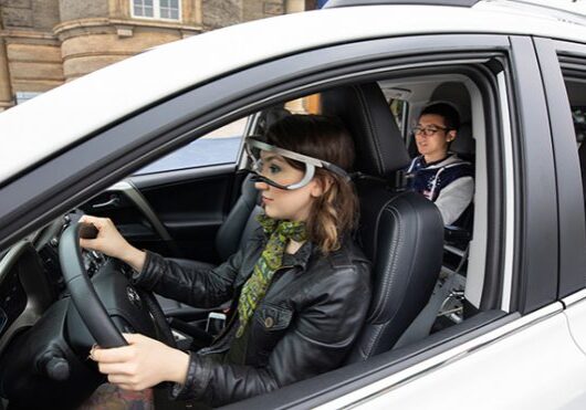 Nazli Kaya (MIE MASc candidate) wears the eye-tracking device used to accurately assess where drivers were looking when turning at intersections. (Credit: Laura Pedersen)